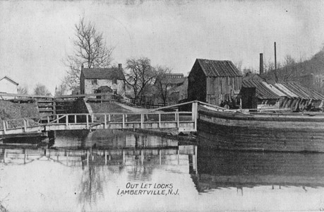 The image show another view of the Lambertville Outlet Lock, which was constructed in 1848 and allowed boats more direct access to the “Coalport” in Trenton.  The outlet lock and cable ferry permitted boats operating on the Delaware Division of the Pennsylvania Canal to avoid traveling south to Bristol, and then north through Bordentown and up the seven locks to where the Feeder joined the main canal at Trenton.  The cable ferry was abandoned in 1913.